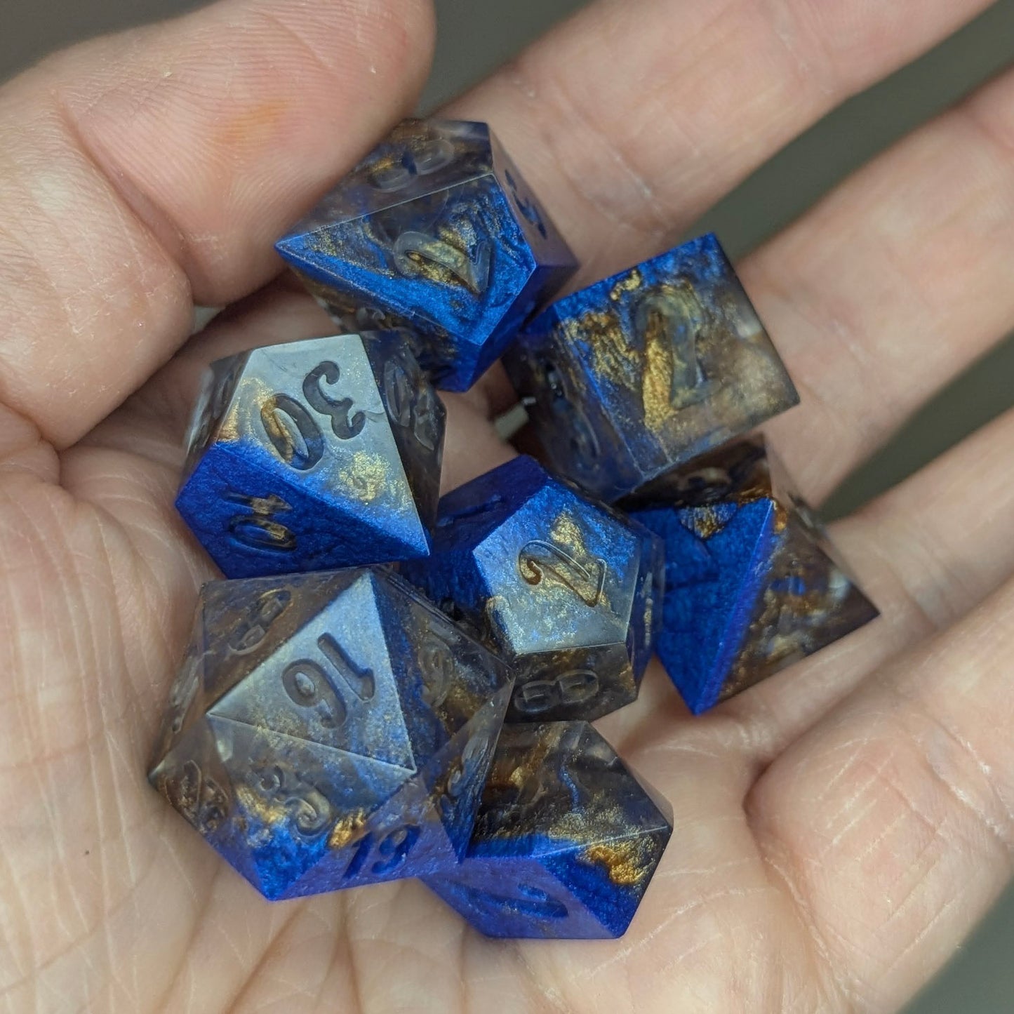 Dwarven Copper - handmade sharp edge 7-piece dice set